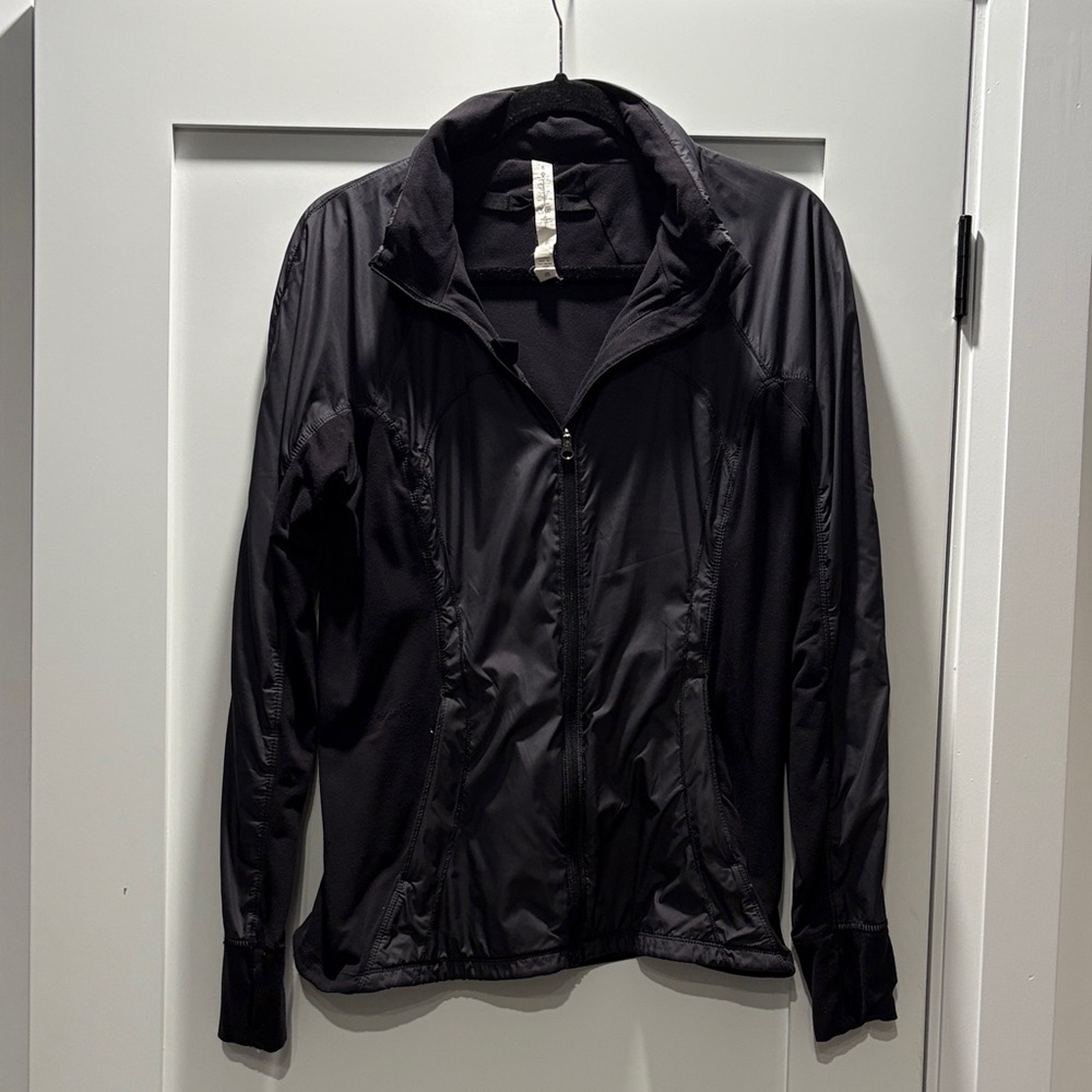 Lululemon size 8 zip up running jacket.